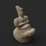 An ancient Late Neolithic Cycladic marble figurine of a seated woman with crossed legs and hands resting on her belly.